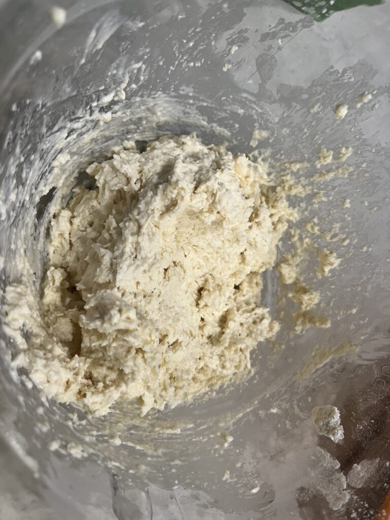 Biscuit dough in a glass bowl